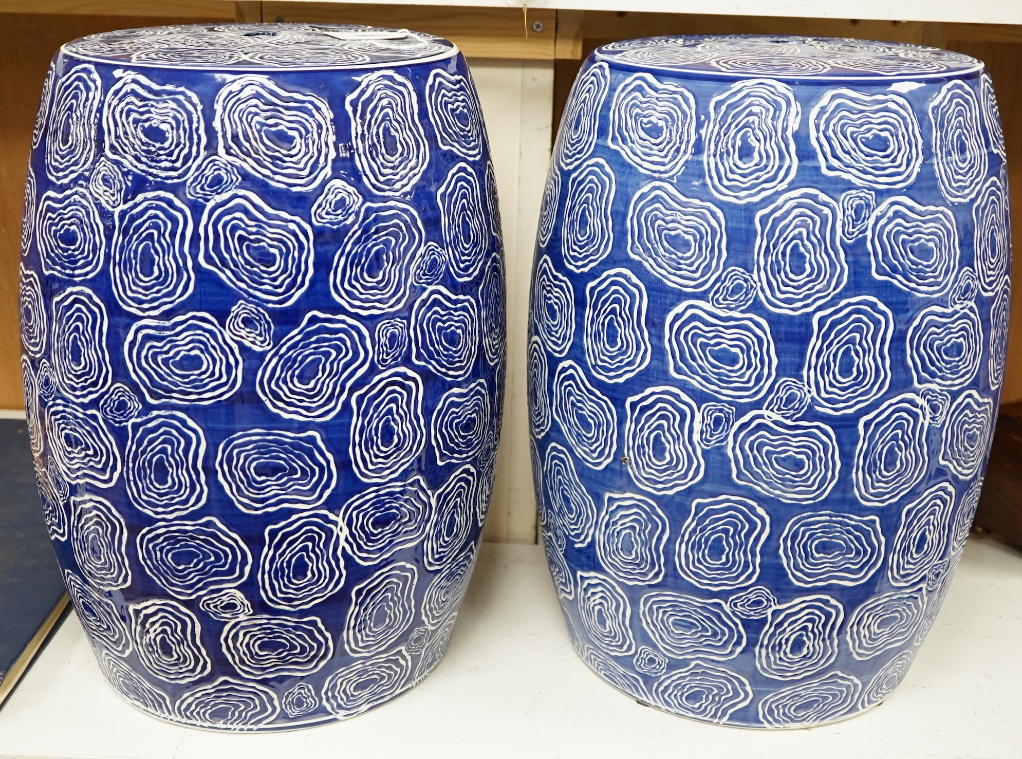 Two Chinese blue and white garden seats, 44cm high. Condition - good